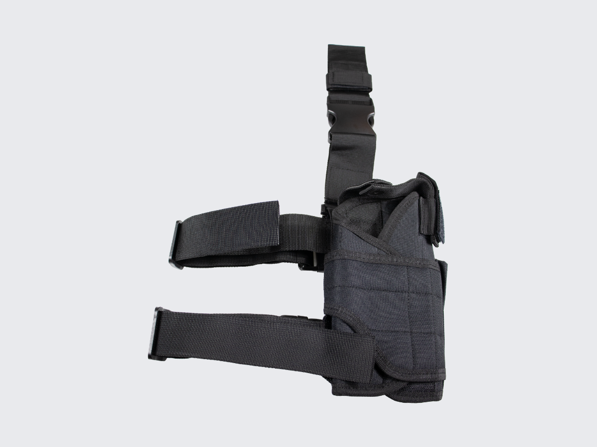 Oikeakätinen musta Canvas reisikotelo pistoolille. Right handed black Canvas drop leg holster for pistol.