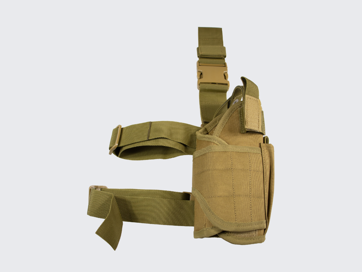 Oikeakätinen hiekan värinen Canvas reisikotelo pistoolille. Right handed tan colored Canvas drop leg holster for pistol.