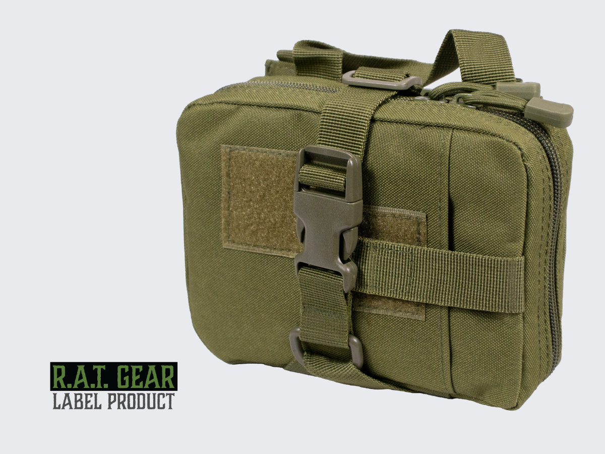 Vihreä RG-12 taktinen varustetasku irrotettavalla takapaneelilla ja monipuolisilla sisäpuolen kiinnitysahdollisuuksilla. Green RG-12 tactical gear pouch with removable back panel and versatile interior attachment options.