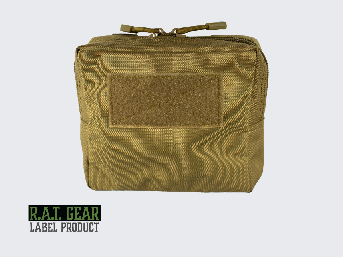 Tan värinen varustetasku RG-14. Kiinnitys helposti ja nopeasti PALS-nauhoitukseen kahdella MOLLE-hihnalla. Tan colored tactical pouch RG-14. Easy and quick attachment to PALS strapping with two MOLLE straps.