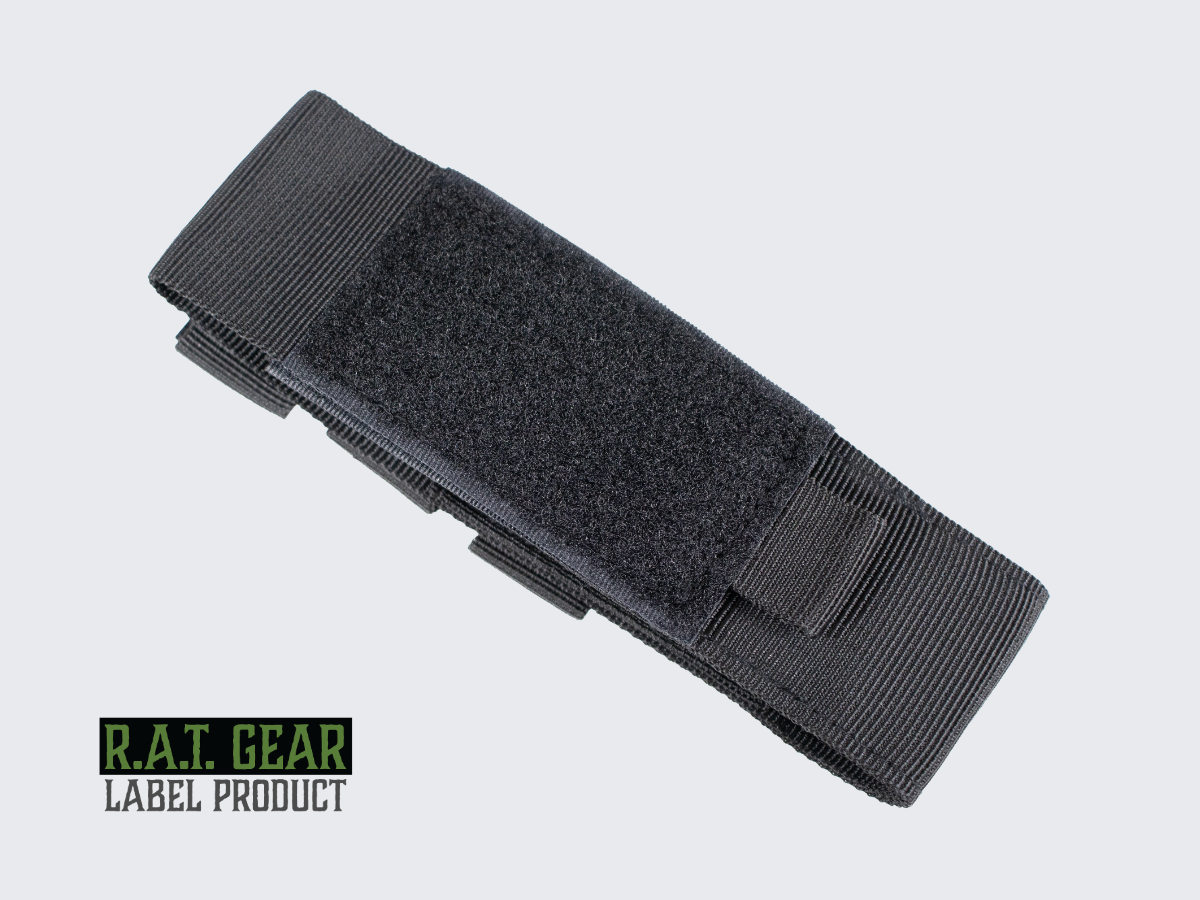 Musta Tourniquet kiristyssiteelle tarkoitettu taktinen varustetasku. Black tactical equipment pouch designed for a tourniquet.