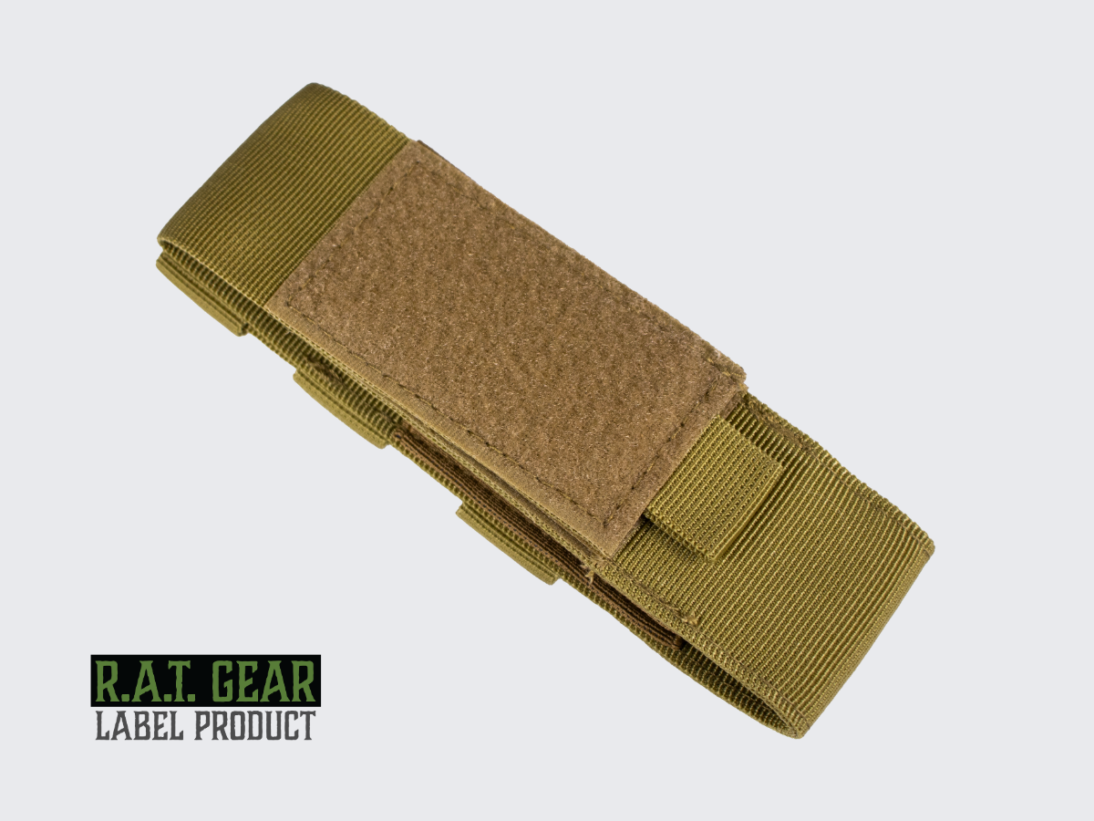Tan värinen Tourniquet kiristyssiteelle tarkoitettu taktinen varustetasku. Tan colored tactical equipment pouch designed for a tourniquet.