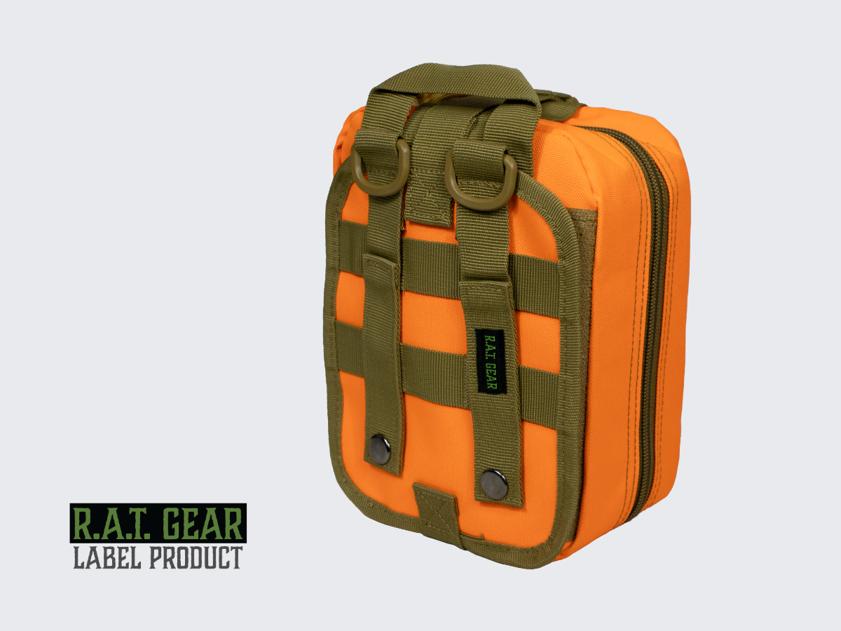 Kirkkaan oranssi taktinen MOLLE ensiapulaukku tärkeimmille ensiaputarvikkeille joita tulet ikinä tarvitsemaan. Bright orange tactical MOLLE First Aid Bag for the most important first aid supplies you will ever need.