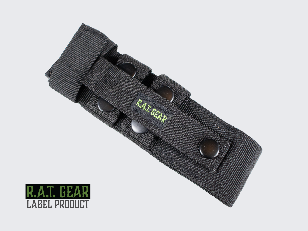 Musta Tourniquet kiristyssiteelle tarkoitettu taktinen varustetasku. Black tactical equipment pouch designed for a tourniquet.