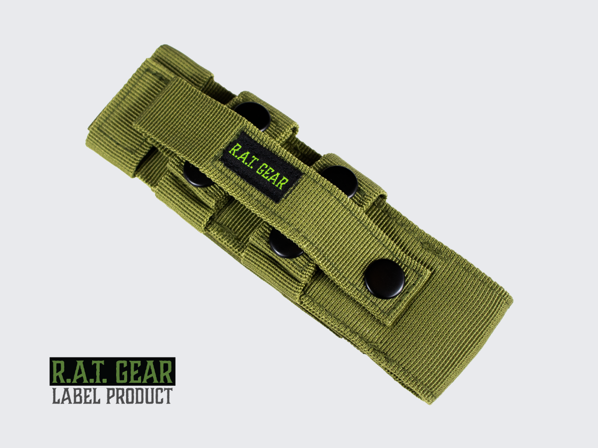 Vihreä Tourniquet kiristyssiteelle tarkoitettu taktinen varustetasku. Green tactical equipment pouch designed for a tourniquet.