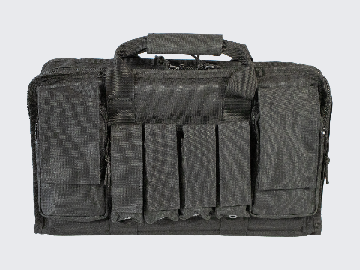 Musta aselaukku kahdelle pistoolille, lippaille sekä muille tarvikkeille. Black cun case for two pistols, pistol magazines and other equipments.