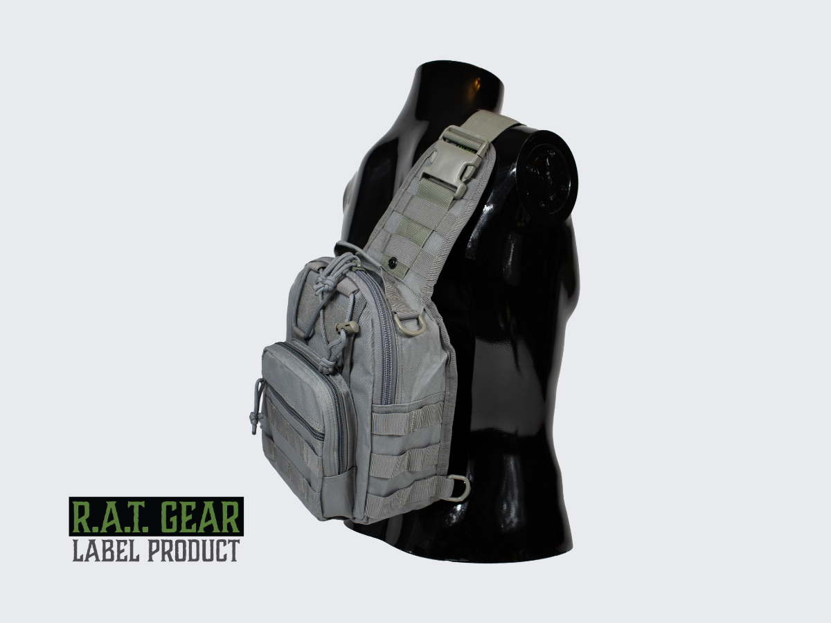 Harmaa pienikokoinen 6 litran olkareppu jokapäiväiseen käyttöön. Grey compact 6 liter sling bag for everyday use.