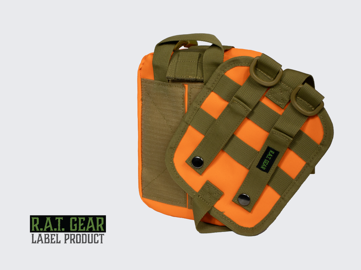 Kirkkaan oranssi taktinen MOLLE ensiapulaukku tärkeimmille ensiaputarvikkeille joita tulet ikinä tarvitsemaan. Bright orange tactical MOLLE First Aid Bag for the most important first aid supplies you will ever need.