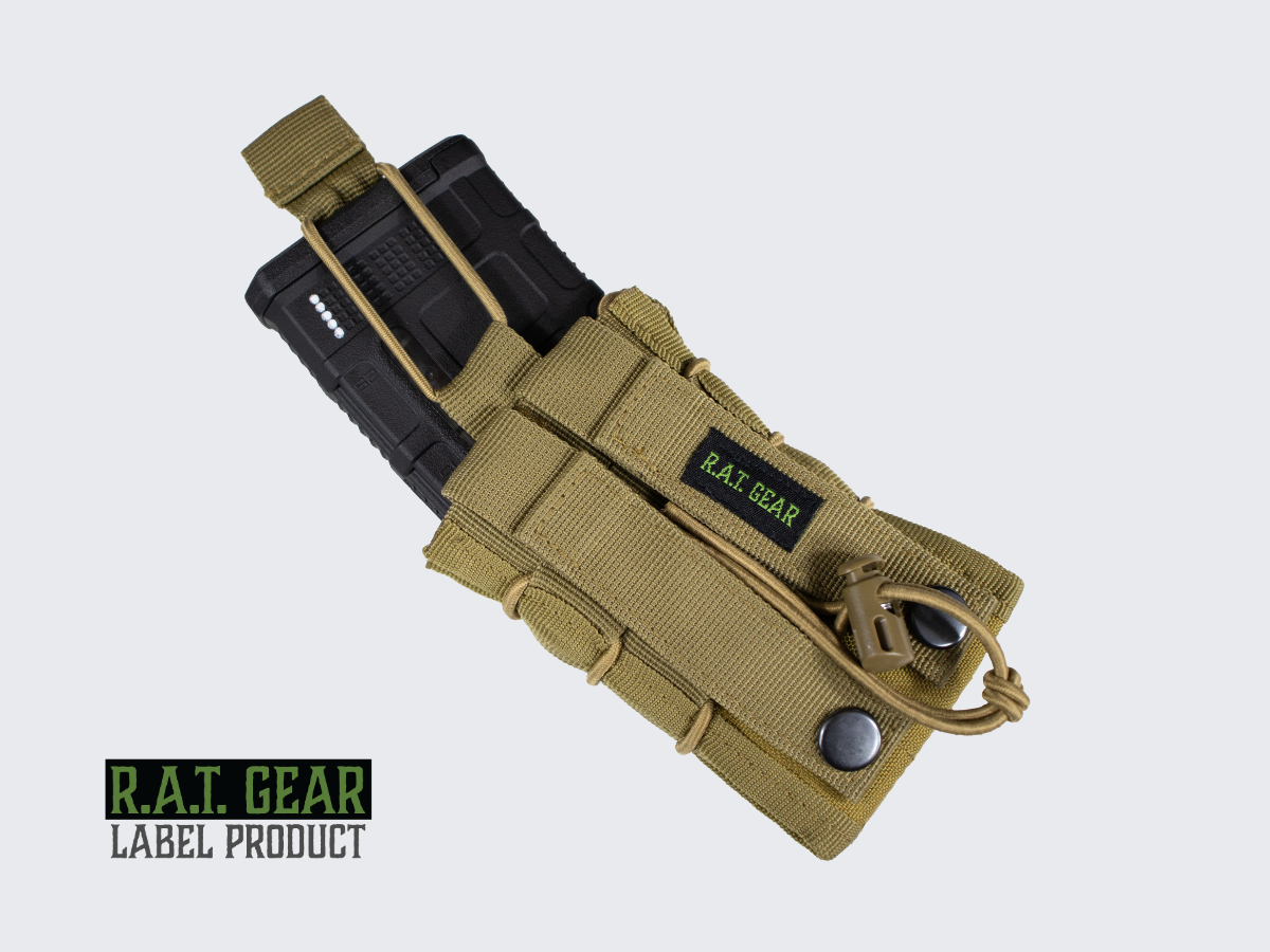 Nylonista valmistettu Tan värinen lipastasku kiväärin ja pistoolin lippaalle kiristysnarulla. Tan colored nylon magazine pouch for rifle and pistol magazines with drawstring.