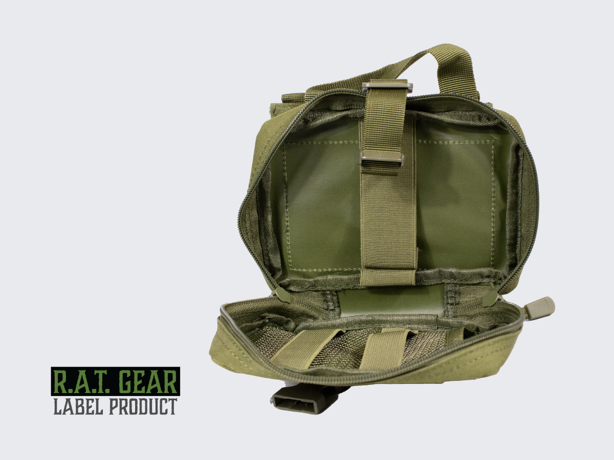 Vihreä RG-12 taktinen varustetasku irrotettavalla takapaneelilla ja monipuolisilla sisäpuolen kiinnitysahdollisuuksilla. Green RG-12 tactical gear pouch with removable back panel and versatile interior attachment options.