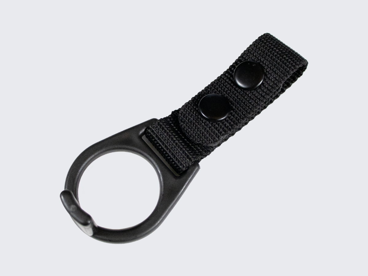 Musta patukan pidike varustevyölle MIL-TEC®. Black baton holder for a gear belt by MIL-TEC®.